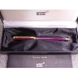 A PURPLE MONTBLANC NOBLESSE OBLIGE BALLPOINT PEN