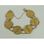 SIX GOLD HALF-SOVEREIGN MOUNTED YELLOW METAL BRACELET, 29grams approx.