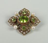 A PRETTY ANTIQUE 9CT YELLOW GOLD SET SEED-PEARL & PERIDOT FLORAL BROOCH, 5.4grams approx.