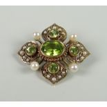 A PRETTY ANTIQUE 9CT YELLOW GOLD SET SEED-PEARL & PERIDOT FLORAL BROOCH, 5.4grams approx.