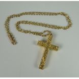 AN ENGRAVED 9CT HOLLOW GOLD CRUCIFIX & FINE 9CT GOLD NECKLACE, 6.8grams approx.