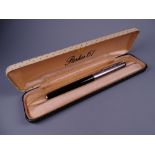 A VINTAGE BLACK PARKER 61 CLASSIC FOUNTAIN PEN with satin Lustraloy cap, in original box