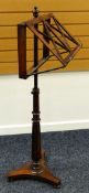 LATE NINETEENTH CENTURY ROSEWOOD MUSIC STAND having turned finial above ratchet design adjustable