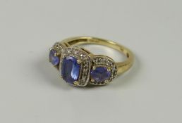 A 14K / 585 YELLOW GOLD POSSIBLY ALEXANDRITE THREE-STONE RING, 4.5grams approx, (size O)
