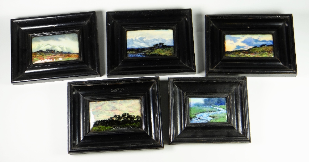 A GROUP OF FIVE SIMILAR ARTS & CRAFTS ENAMEL LANDSCAPE PLAQUES BY CHARLES FLEETWOOD VARLEY two of