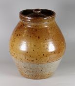 A SARAH WALTON STUDIO POTTERY SALTGLAZED BREAD CROCK of ovoid form with lid and two tone glaze,