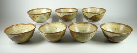 SET OF SEVEN DAVID LLOYD JONES STUDIO POTTERY BOWLS with mottled glaze, potter's mark, 13cms diam