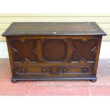 AN EARLY 20th CENTURY CARVED OAK MULE CHEST, 73.5 cms high, 122.5 cms wide, 51.5 cms deep