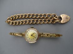 A NINE CARAT CHESTER GOLD CASED LADY'S WRISTWATCH on expanding gold plated strap with a nine carat