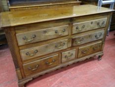 A CIRCA 1830 MAHOGANY LANCASHIRE MULE CHEST of two blind over four opening drawers with reeded