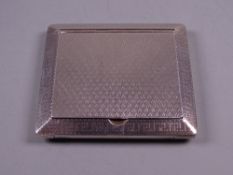 AN ENGINE TURNED SQUARE SILVER STAMP? HOLDER with hinged lid, 1.4 troy ozs, Birmingham 1913 by