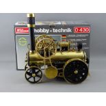 A WILESCO D430 LOKOMOBILE LIVE STEAM TRACTION ENGINE, appears unused with original box and