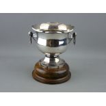 A PEDESTAL SILVER ROSE BOWL with swing handles on a turned wooden stand, 12 cms high, 13 cms