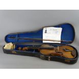 A 19th CENTURY VIOLIN & BOW in a fitted case, interior label reads 'Copy of John Baptiste