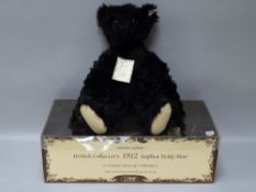 A STEIFF BRITISH COLLECTOR'S 1912 REPLACE TEDDY BEAR in black mohair, button in ear white tag no.