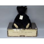 A STEIFF BRITISH COLLECTOR'S 1912 REPLACE TEDDY BEAR in black mohair, button in ear white tag no.