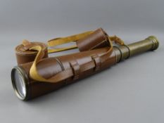 A LEATHER CASED FOUR DRAW TELESCOPE by Broadhurst, Clarkson & Co Ltd, London, with lens caps, 84 cms