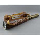 A LEATHER CASED FOUR DRAW TELESCOPE by Broadhurst, Clarkson & Co Ltd, London, with lens caps, 84 cms