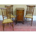 A MAHOGANY POT CUPBOARD and three cane seated bedroom chairs by Lamb of Manchester, the chairs