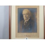 A PHOTOGRAPHIC PORTRAIT OF DAVID LLOYD GEORGE, signed in full beneath, 30 x 22.5 cms