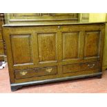 A LATE 18th CENTURY OAK MULE CHEST with joined oak four panel front and twin lower drawers, oak