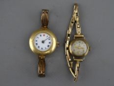 A LADY'S VINTAGE TUDOR NINE CARAT GOLD WRISTWATCH with bracelet strap, 15 grms gross and an unmarked