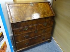 A LATE 18th CENTURY WALNUT FALL FRONT BUREAU with interior drop down well and fitted arrangement