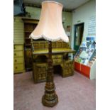 A SUPERB CARVED MAHOGANY STANDARD LAMP, the substantial base with turned and acanthus leaf