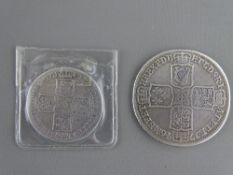 A GEORGE II 1746 SILVER LIMA HALF CROWN and a 1758 silver shilling