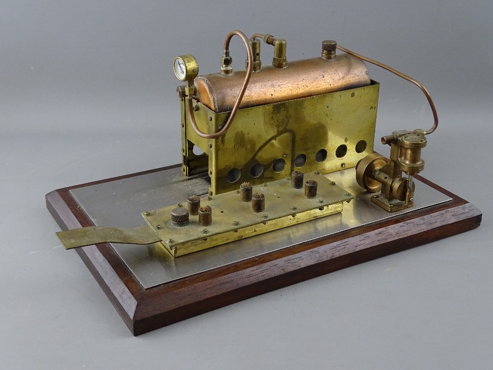 A SCRATCH BUILT LIVE STEAM HORIZONTAL STATIONARY ENGINE with copper boiler and pressure gauge,