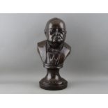 A BRONZED COMPOSITION BUST OF WINSTON S CHURCHILL, 33 cms high