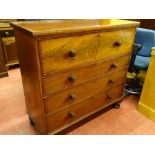 A VICTORIAN MAHOGANY CHEST OF FOUR DRAWERS with turned wooden knobs and deep top drawer, on