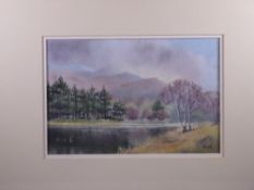 J? KEAL watercolour - study of trees alongside a lake with mountain backdrop, signed, 17.5 x 26.5