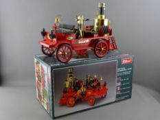 A WILESCO D305 LIVE STEAM VINTAGE FIRE ENGINE, appears unused with original box, instructions and
