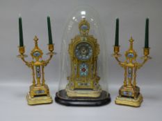 A 19th CENTURY GILT METAL & CHAMPLEVE ENAMEL CLOCK GARNITURE, the dial marked 'Nathan & Co' set with