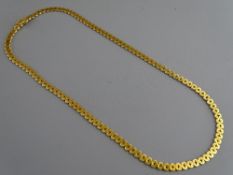 AN EIGHTEEN CARAT GOLD FLAT LINK NECKLACE, 27.8 grms gross, 43 cms long