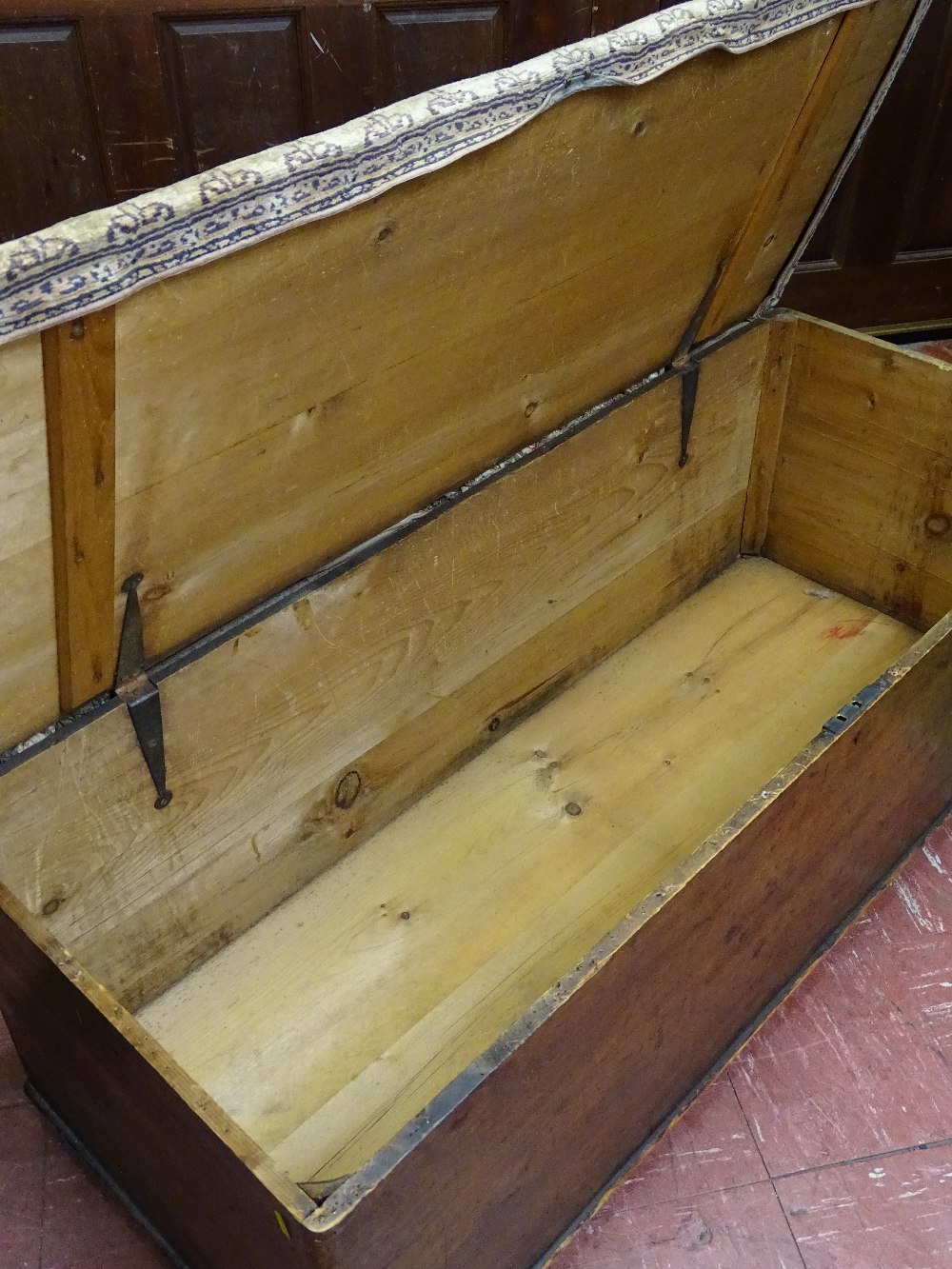 AN ANTIQUE SCUMBLED PINE BLANKET CHEST with upholstered pad top and raised on castors, 48 cms - Image 2 of 2