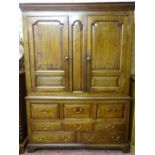 A GOOD 18th CENTURY WELSH OAK PRESS CUPBOARD with shaped and chamfered panels and a full mixed