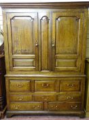 A GOOD 18th CENTURY WELSH OAK PRESS CUPBOARD with shaped and chamfered panels and a full mixed