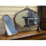 TWO VINTAGE DRESSING MIRRORS, a Regency style oval swing mirror on stand and a smaller easel stand