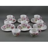 A FOURTEEN PIECE SHELLEY CHINA COFFEE SET of six cups, six saucers, milk jug and sugar basin,