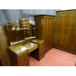 A GOOD VINTAGE OAK FOUR PIECE BEDROOM SUITE of lady's and gent's two door wardrobes, a mirrored