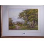 W G HUGHES watercolour - rural scene with wooded track and stile, signed and indistinctly titled and