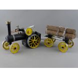 A MAMOD LIVE STEAM TRACTION ENGINE with timber carriage, in black and yellow livery