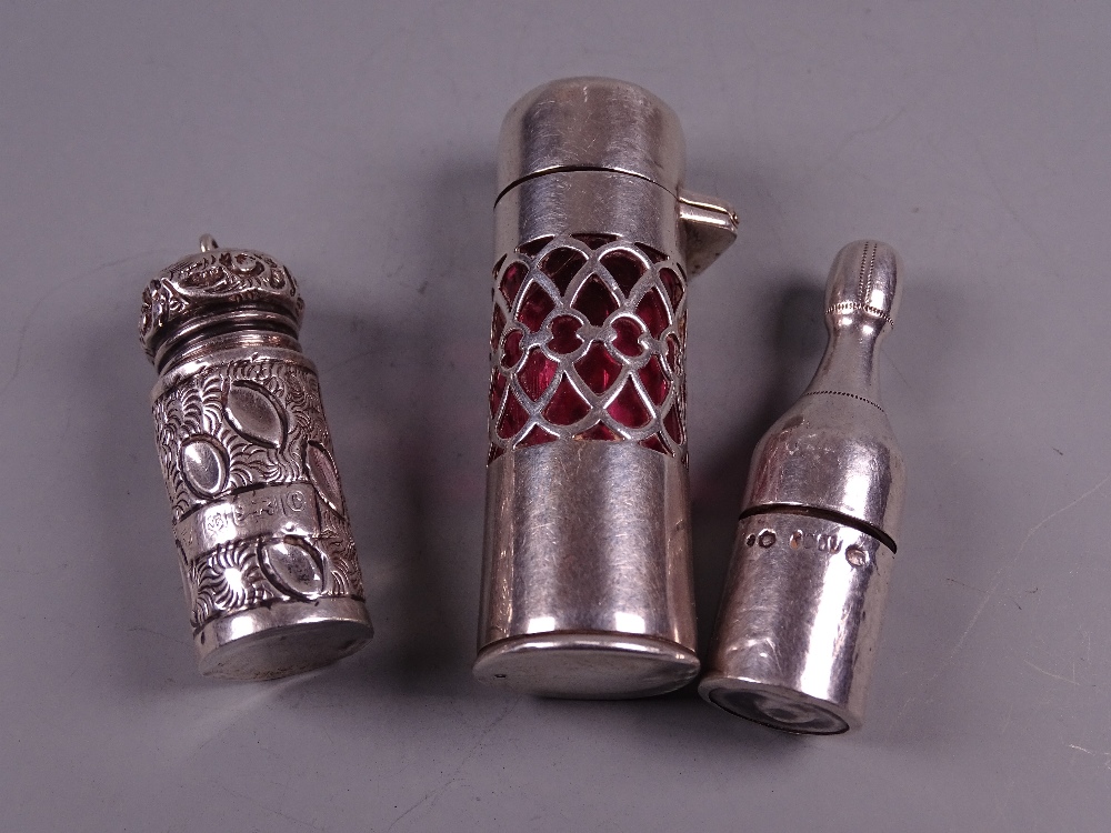 A SILVER & RUBY GLASS PERFUME CONTAINER, the body with lattice work and with a hinged lid (no - Image 2 of 3