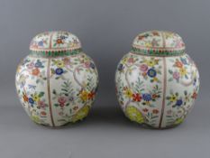 A PAIR OF ORIENTAL GINGER JARS & COVERS with enamel decorated panels of birds and flowers, single