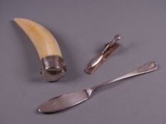 A PLAIN SILVER BUTTER KNIFE, a silver paper clip and a silver hinged ivory horn container (parcel of