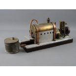 A SCRATCH BUILT LIVE STEAM HORIZONTAL STATIONARY ENGINE, 33 cms long overall, burner and tank in