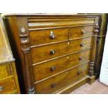 A VICTORIAN MAHOGANY CHEST OF DRAWERS having a top spring release secret drawer over two short and