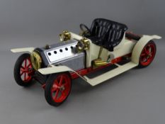 A MAMOD STEAM ROADSTER MOTOR CAR in cream and red livery